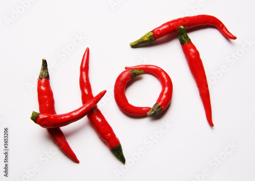 Photo: Red hot chilli peppers spelling the word "hot" Red hot chilli peppers spelling the word "hot"