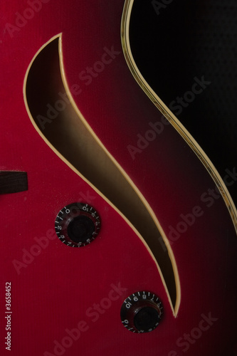 Photo: close up of a jazz guitar close up of a jazz guitar