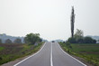 Highway with fields aside and sky above