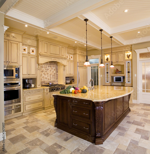 Photo: Beige kitchen with a large island Beige kitchen with a large island