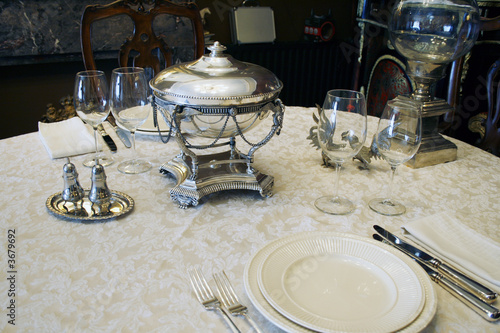 Photo: beautiful antique table setting with silver soup bowl beautiful antique table setting with silver soup bowl