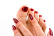 Woman feet massage isolated in white background.