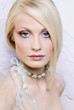 Portrait of the young blonde in a wedding veil