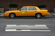 Parked yellow taxi, side view, Manhattan, New York Parked yellow taxi, side view, Manhattan, New York