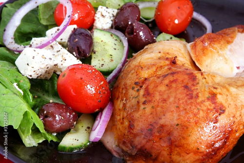 Photo: Roast chicken and Greek salad Roast chicken and Greek salad