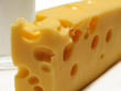 Photo en ligne au meilleur prix Cheese with large holes and glass of milk