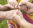 Photographie : family concept (focus point on hands of the woman)