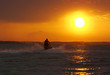 wave runner during sundown scenic