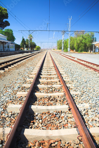 Photo: Train tracks in front of the train station Train tracks in front of the train station