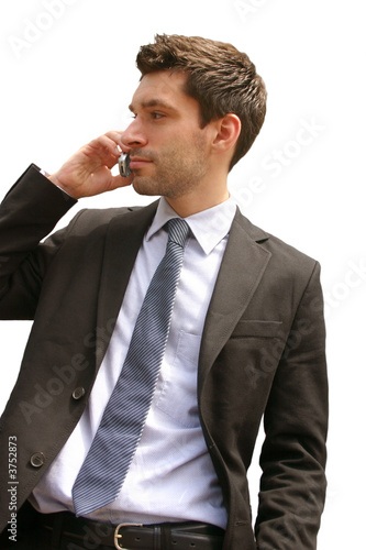 Foto: business man mit handy isoliert auf weiß business man mit handy isoliert auf weiß