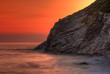 Sunset by the ocean