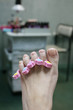 Barefooted female leg in a pedicure study