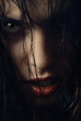 Close-up portrait of woman-witch with wet hairs