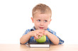 3 years old at desk isolated on white
