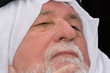 older middle-eastern man with white beard