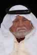 older middle-eastern man with white beard, 
