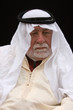older middle-eastern man with white beard, 