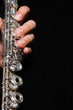 Flute in hands - music background. Classic music concert concept