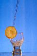 A glass with a drink splashing about 2