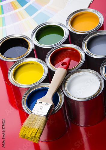 Photo: colorful cans and brush colorful cans and brush