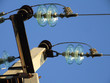 Photo en ligne au meilleur prix high-voltage insulator in the blue sky