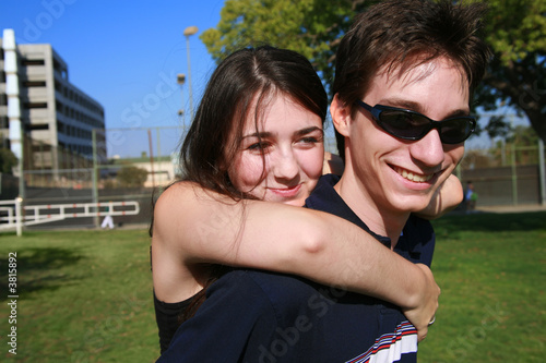 Photo: Young couple having fun outdoors Young couple having fun outdoors