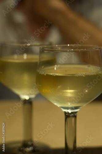 Photo: Two glasses white wine Two glasses white wine