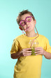 Enjoying a green health juice containing wheatgrass,