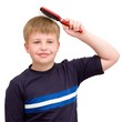 boy combs the hair