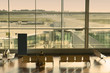 woman waiting in the airport at sunset