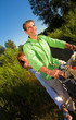 couple enjoying the sunset outdoor with a bicycle