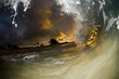 giant wave breaking at sunrise