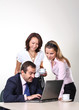 Three colleagues working at a computer Three colleagues working at a computer