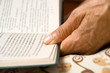 hand of reading a book woman