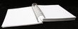 notebook with spiral binding isolated on black