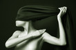 Naked (nude) woman with  black bandage.  Artistic photo.