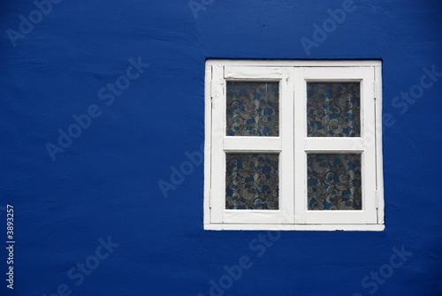 Photo: Colorful old window in the city Colorful old window in the city