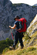 Mountaineer hiking in mountains, slovenia, europe