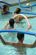 People doing water aerobic in pool