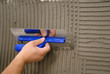 hand holding plastering tool