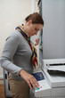 Office. Woman printing a documents. Routine. Office. Woman printing a documents. Routine.