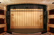 Theater stage with gold safety curtains Theater stage with gold safety curtains