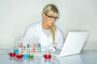 Beautifula female lab worker testing and experimenting