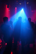 Dancing people in an underground club