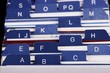 Photo en ligne au meilleur prix Close up of desktop business card index holder.