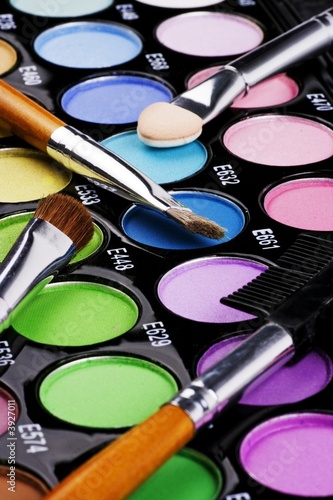 Photo: A make-up multi colored palette close up. A make-up multi colored palette close up.
