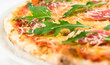 Pzza with sausages and salad Pzza with sausages and salad