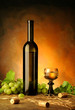 Still life with wine bottle, glass and grapes