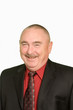 smiling businessman over white