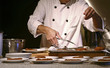 A chef preparing food.